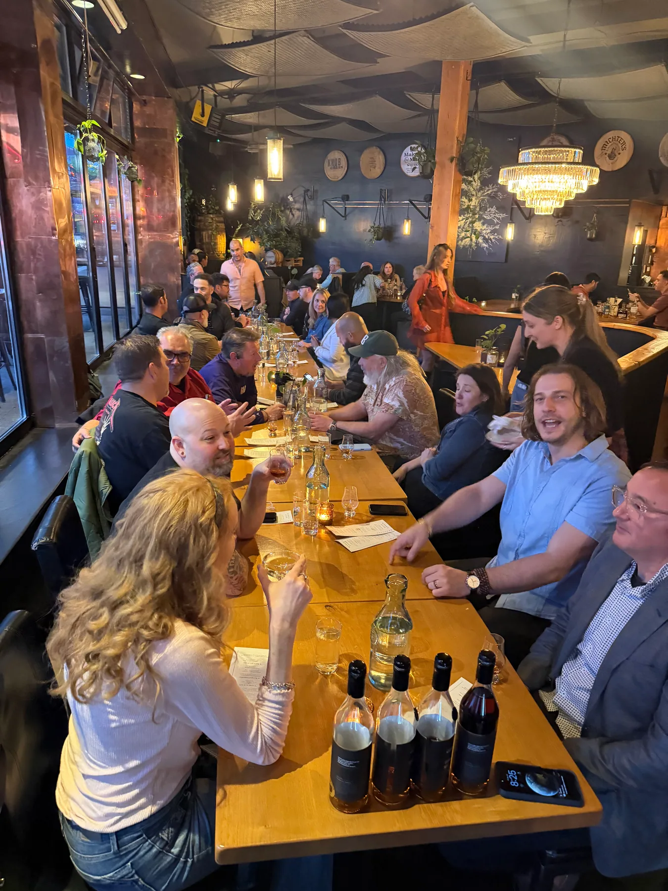 A lively group of guests enjoying dinner together
