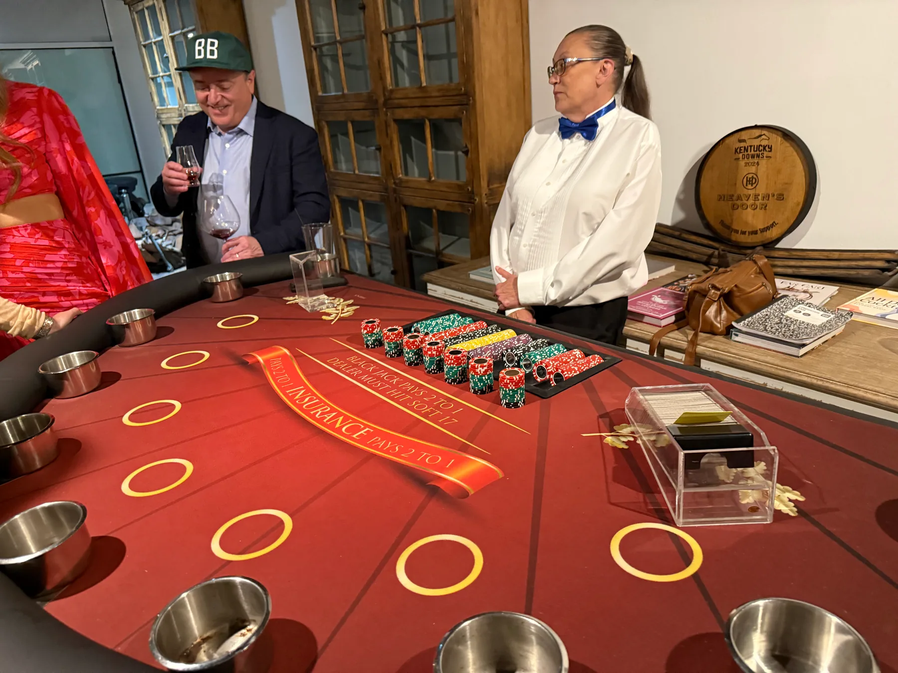 A casino table and attendants ready for event guests