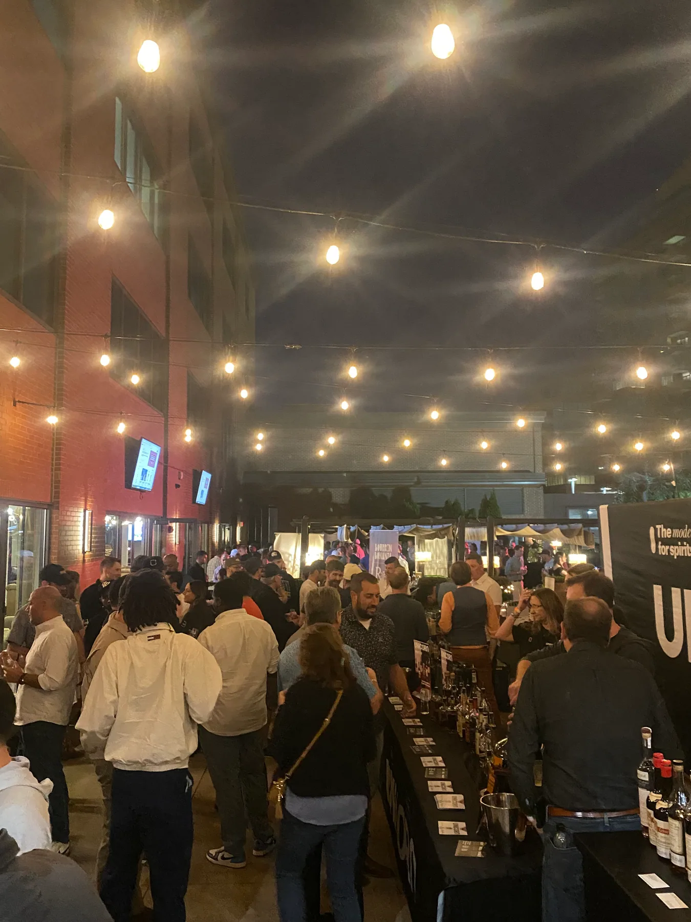 A large crowd gathered inside an event hall